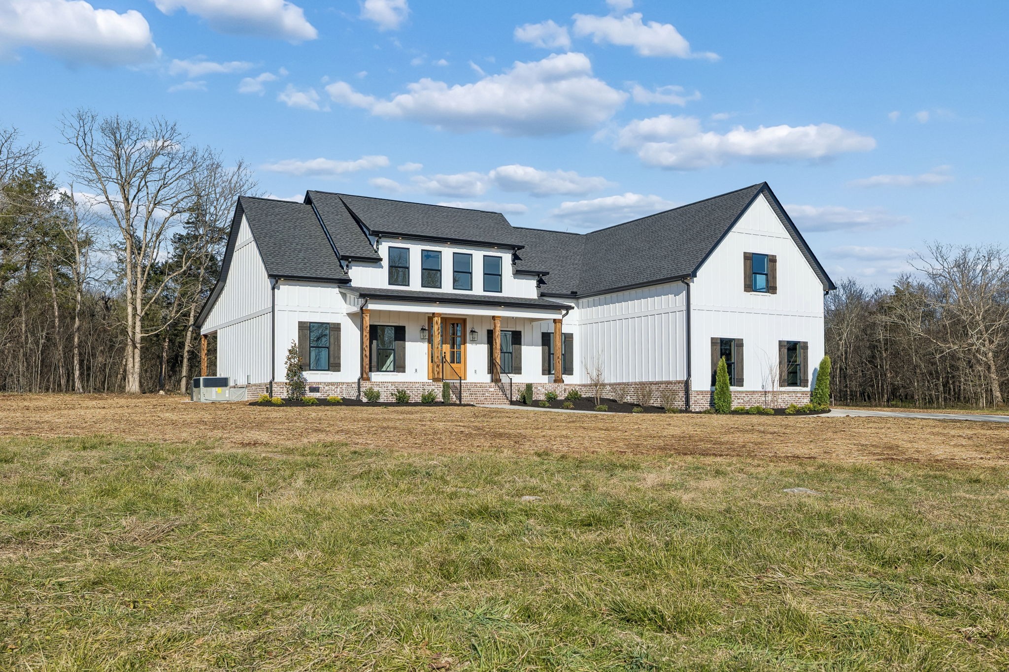 8533 Twelve Corners Road Lascassas, TN 37085 - Photo 3 of 79 a front view of a house with a garden