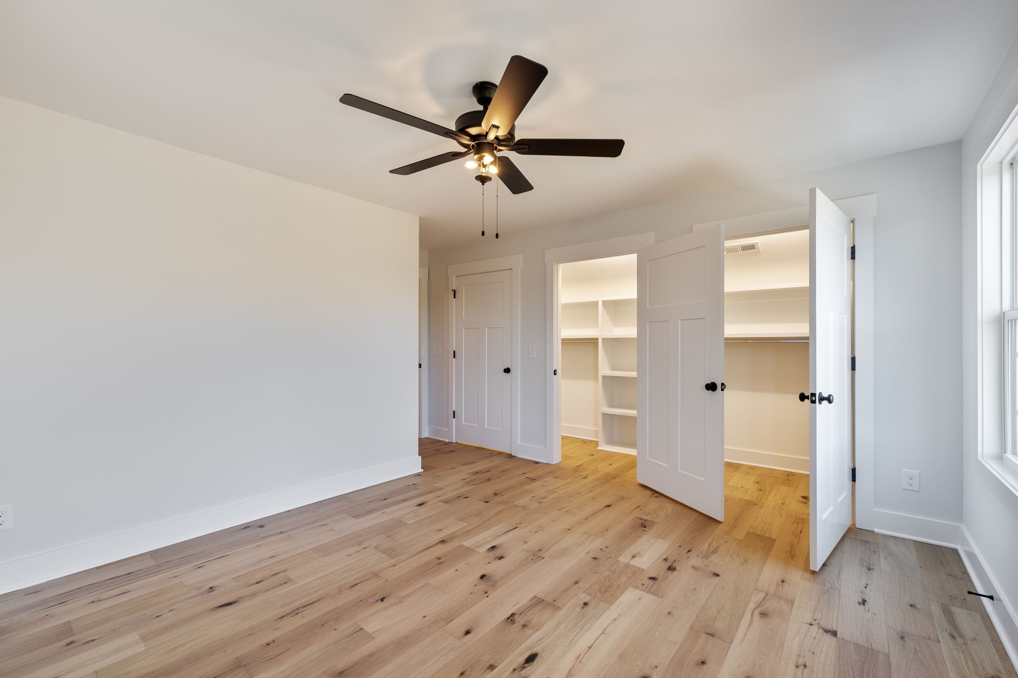 8533 Twelve Corners Road Lascassas, TN 37085 - Photo 52 of 79 a view of empty room with wooden floor