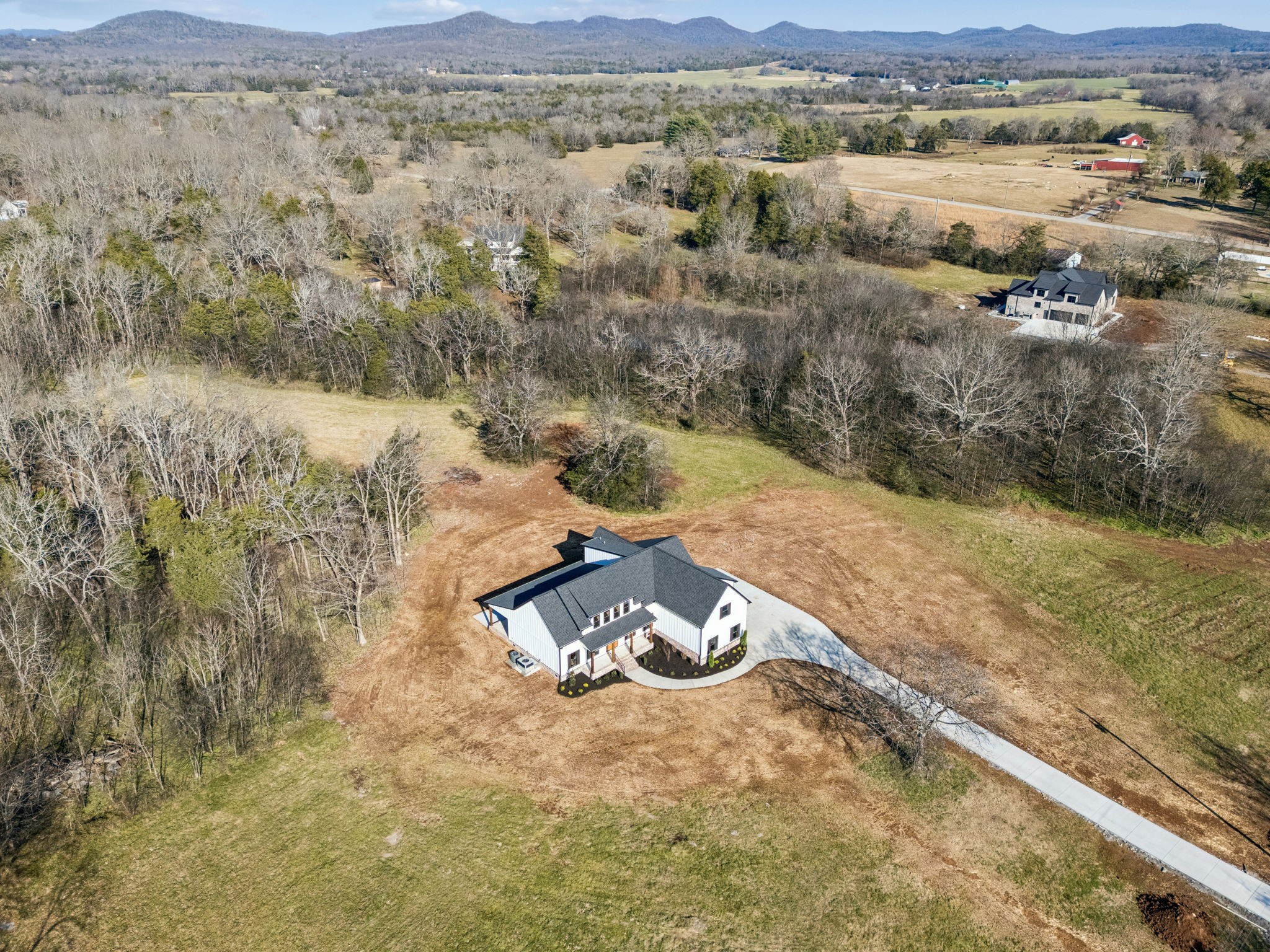 8533 Twelve Corners Road Lascassas, TN 37085 - Photo 68 of 79 an aerial view of a house with a mountain
