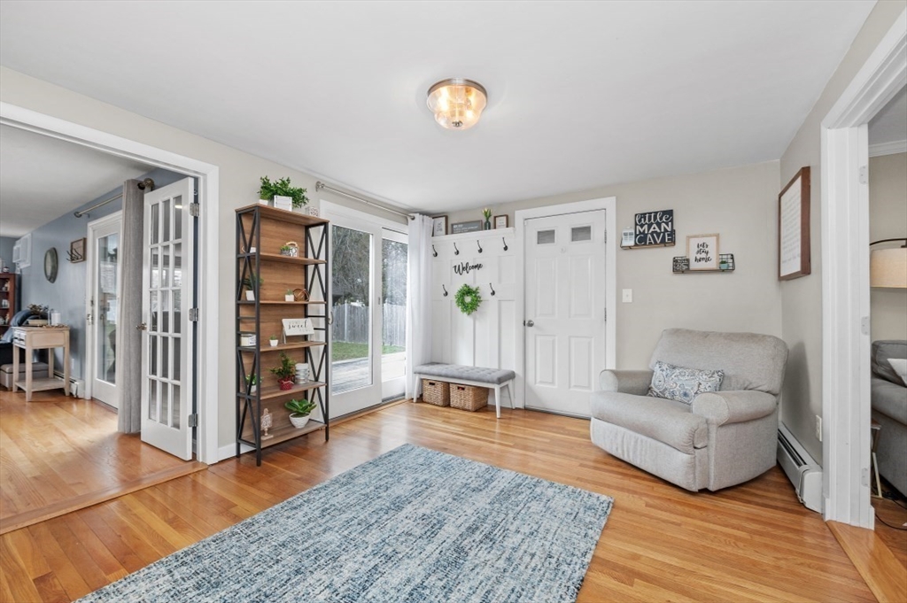 10 Shade Street Waltham, MA 02452 - Photo 13 of 33 a living room with furniture and wooden floor