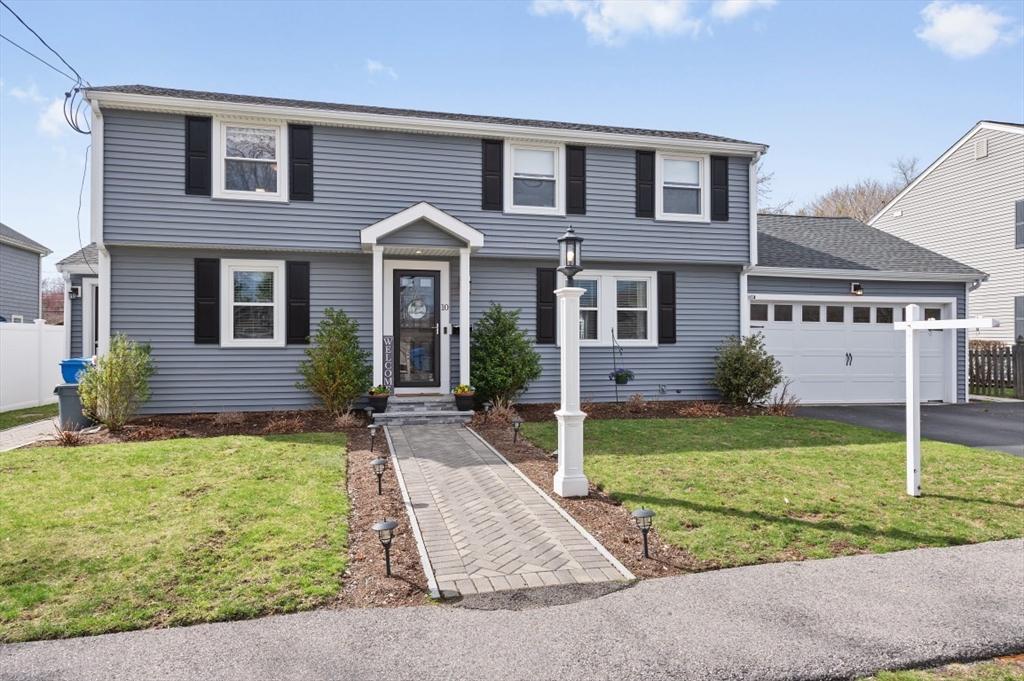 10 Shade Street Waltham, MA 02452 - Photo 2 of 33 front view of a house with a yard