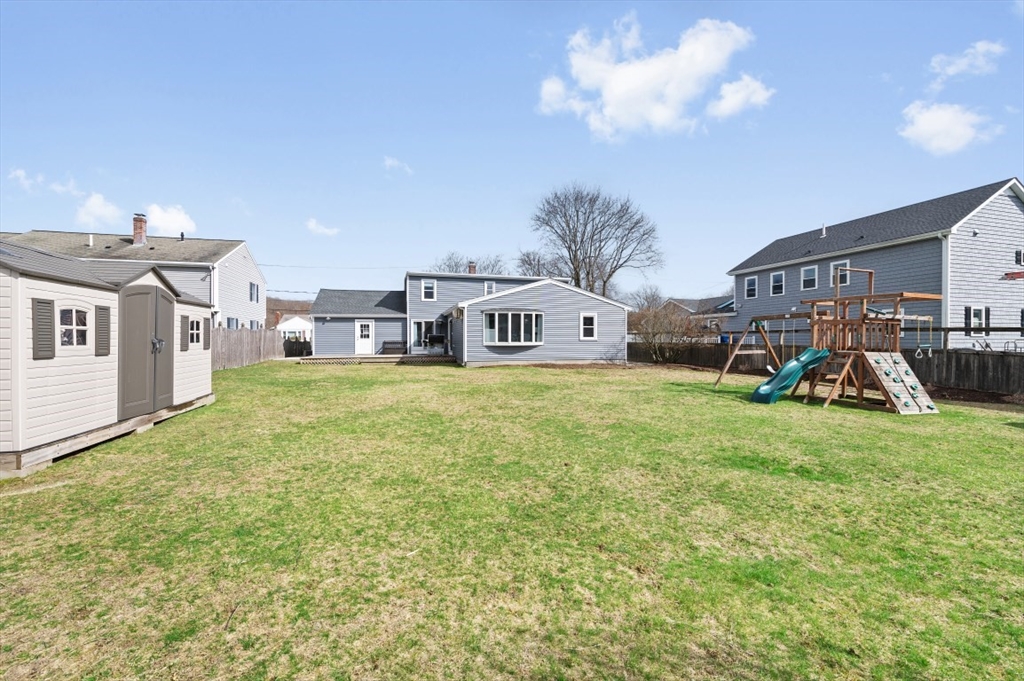 10 Shade Street Waltham, MA 02452 - Photo 29 of 33 a front view of a house with garden