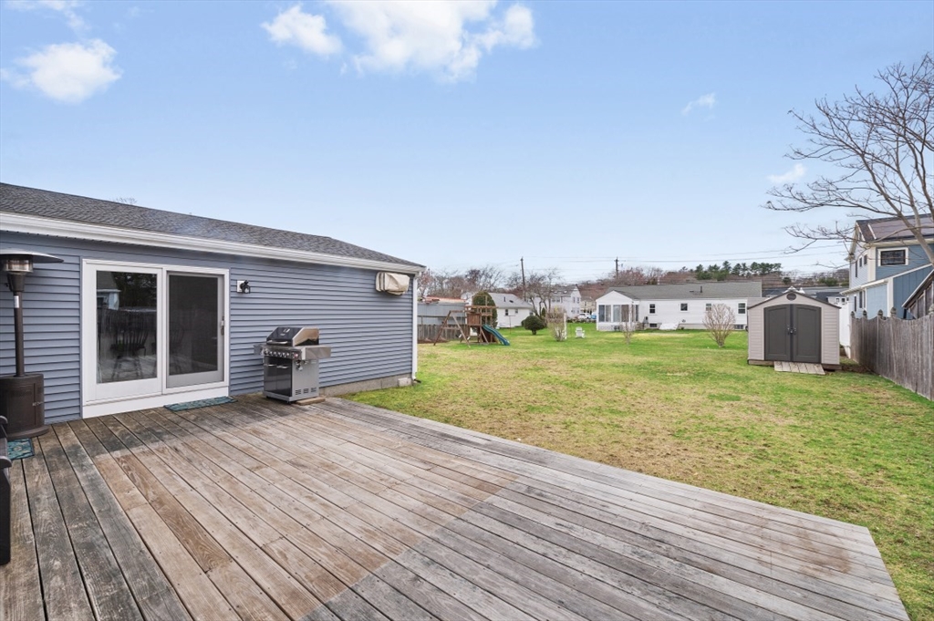 10 Shade Street Waltham, MA 02452 - Photo 30 of 33 a view of a house with a yard and sitting area