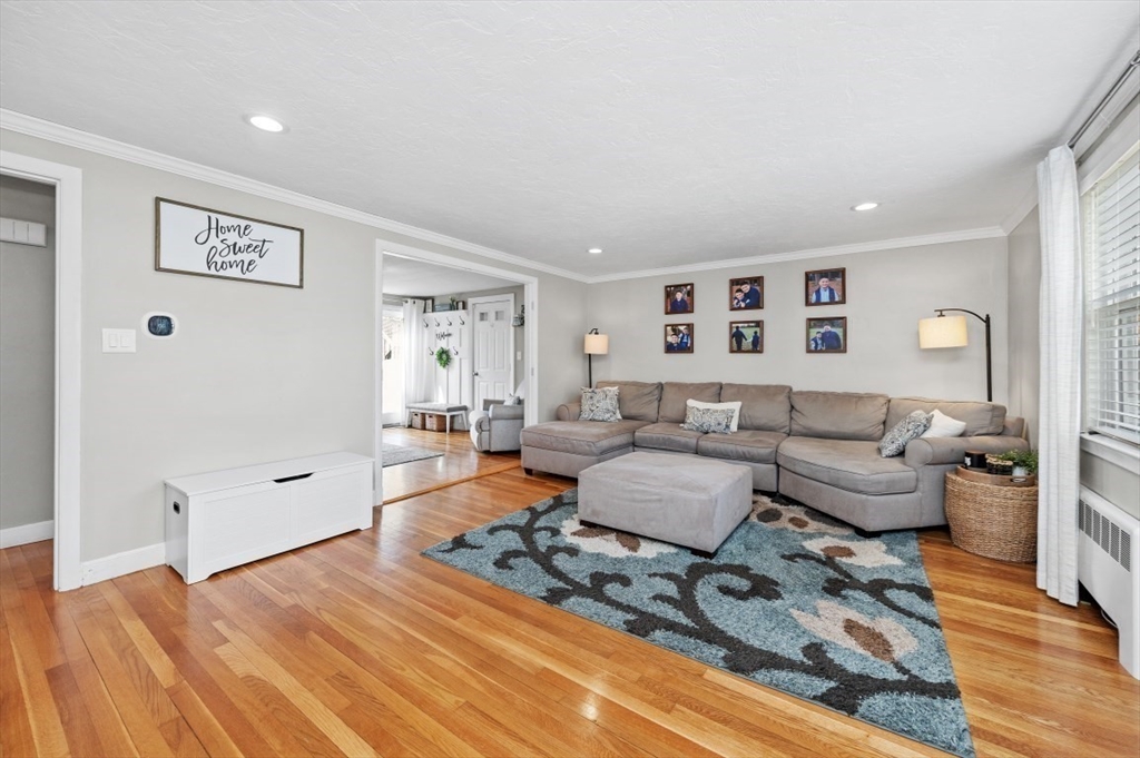 10 Shade Street Waltham, MA 02452 - Photo 9 of 33 a living room with furniture and wooden floor