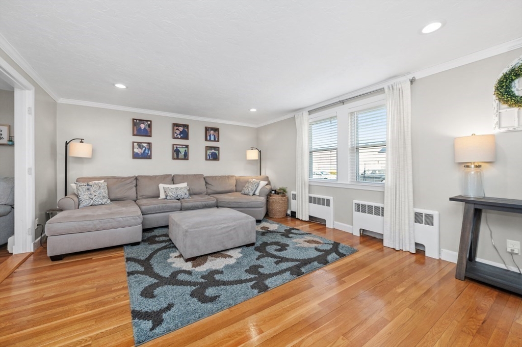 10 Shade Street Waltham, MA 02452 - Photo 10 of 33 a living room with furniture and a wooden floor