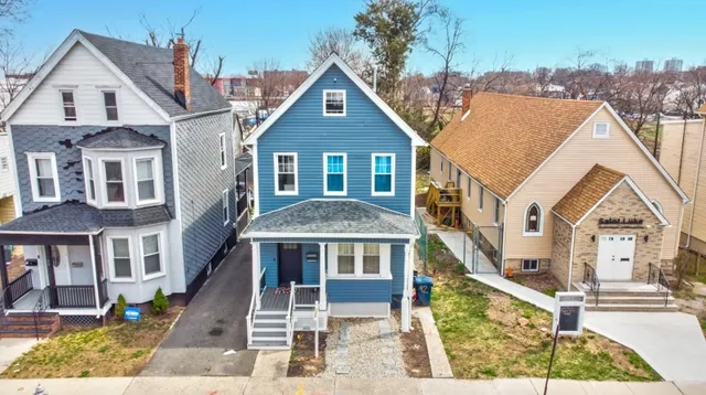 a front view of a house with a porch