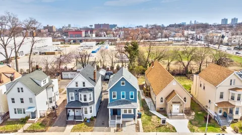a view of a city with tall buildings