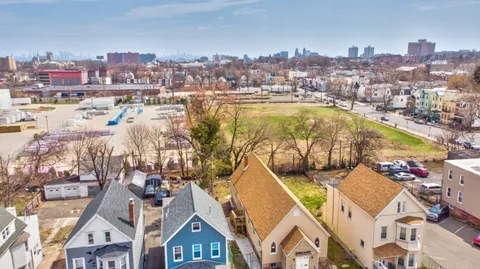 a view of a city with tall buildings