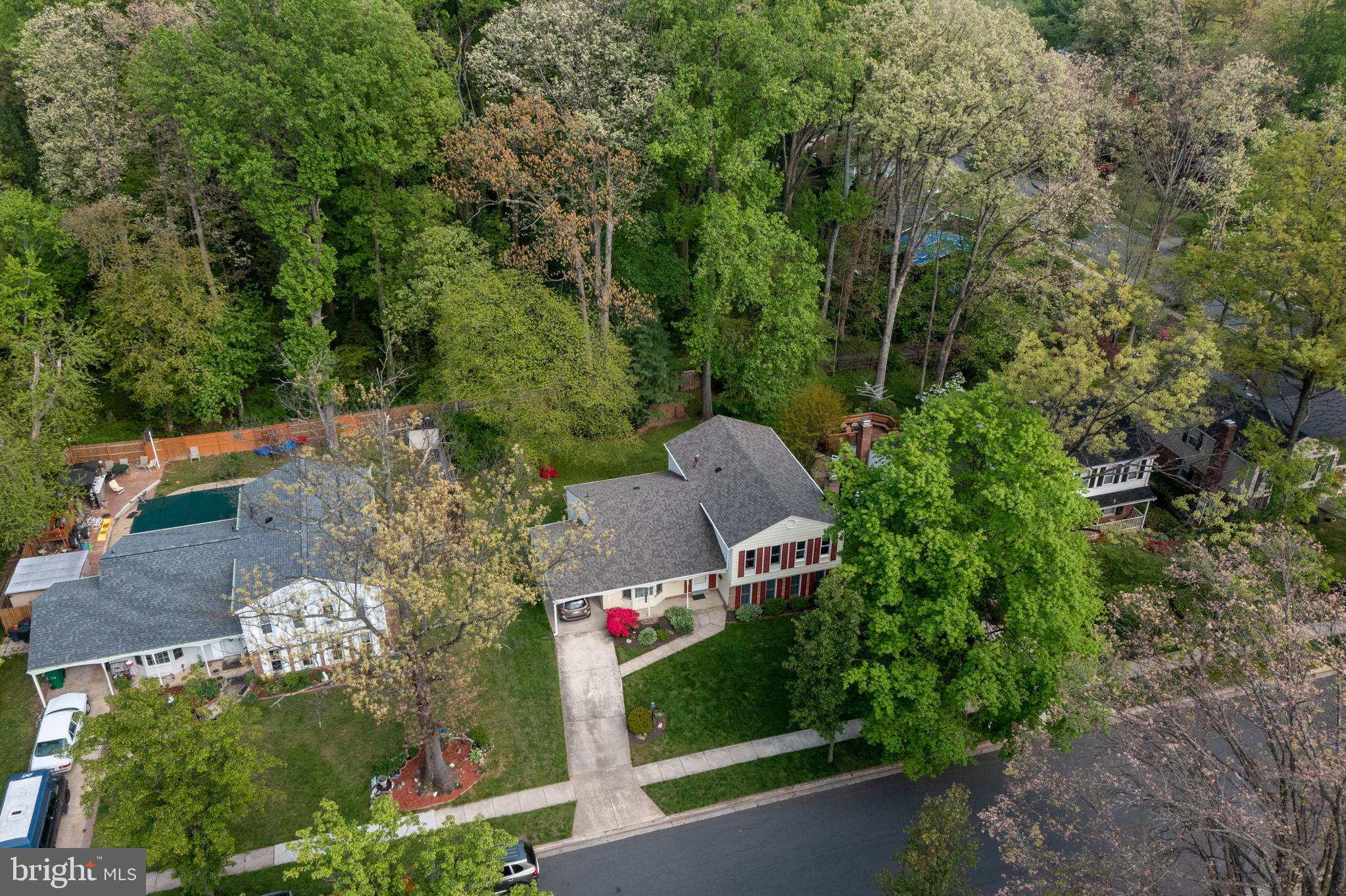 223 Summit Hall Road Gaithersburg, MD 20877 - Photo 3 of 60 an aerial view of a house with a yard and outdoor seating
