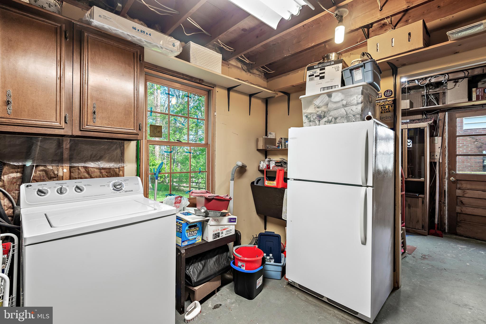 223 Summit Hall Road Gaithersburg, MD 20877 - Photo 53 of 60 a utility room with dryer and washer
