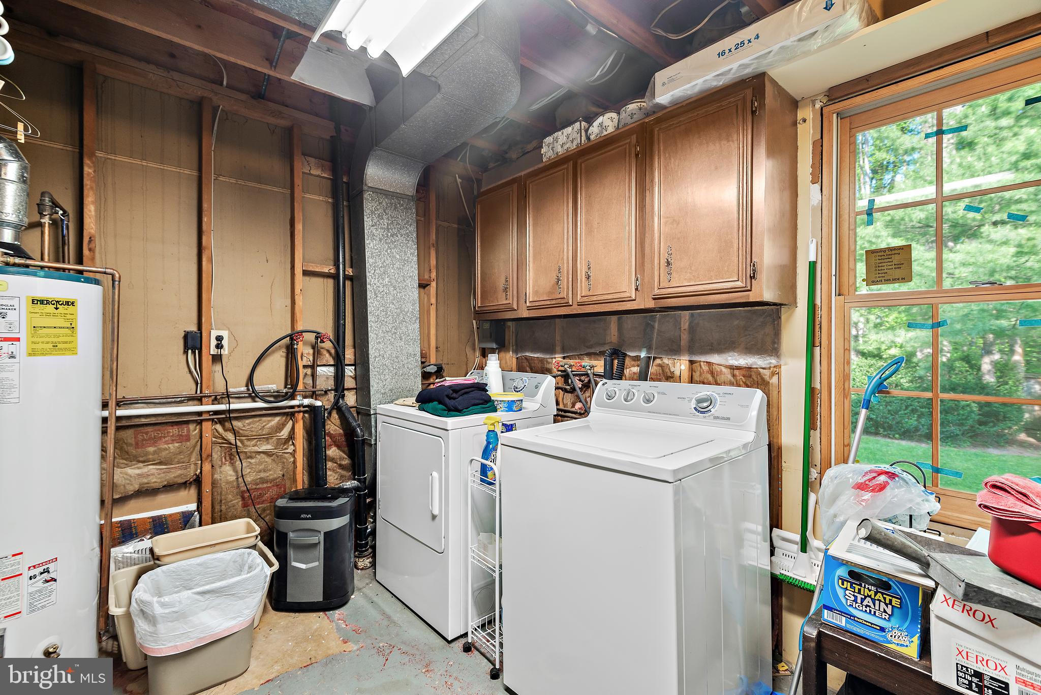 223 Summit Hall Road Gaithersburg, MD 20877 - Photo 54 of 60 a view of storage and utility room with washer and dryer