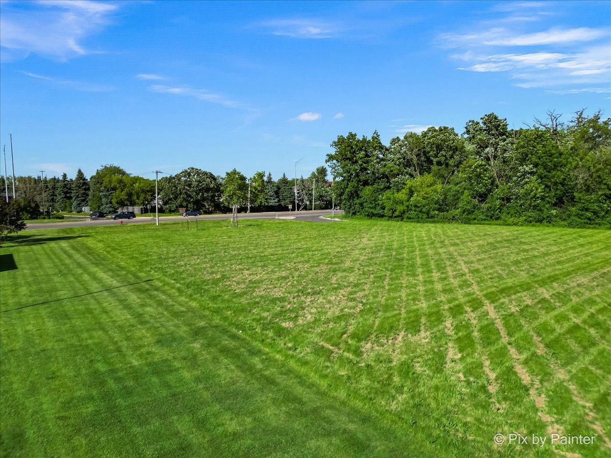 6850 Huntley Road Carpentersville, IL 60110 - Photo 8 of 16 a view of a field with an outdoor space