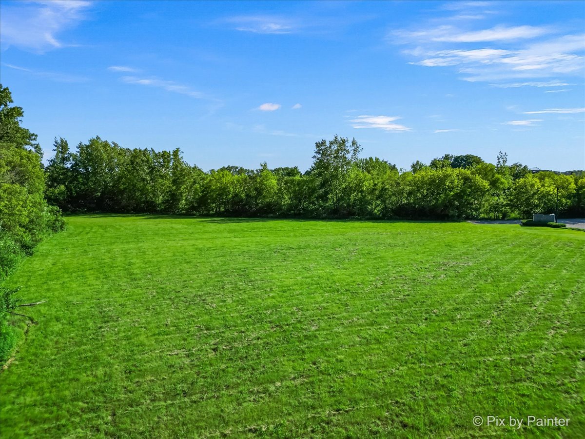 6850 Huntley Road Carpentersville, IL 60110 - Photo 10 of 16 a view of a green field with clear sky