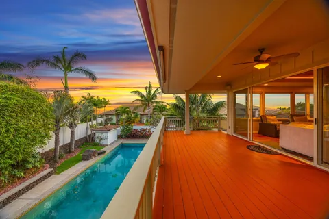 a view of swimming pool with a patio