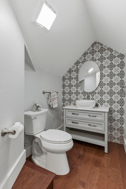 5425 Cherokee Draw Road Austin, TX 78738 - Photo 28 of 40 A clever design solution, this compact powder room utilizes every inch for both style and utility.
