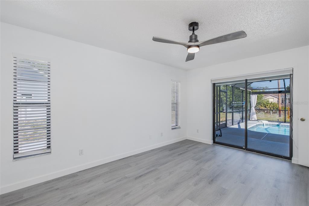 8285 Galgano Lane Spring Hill, FL 34606 - Photo 21 of 55 a view of an empty room with a window