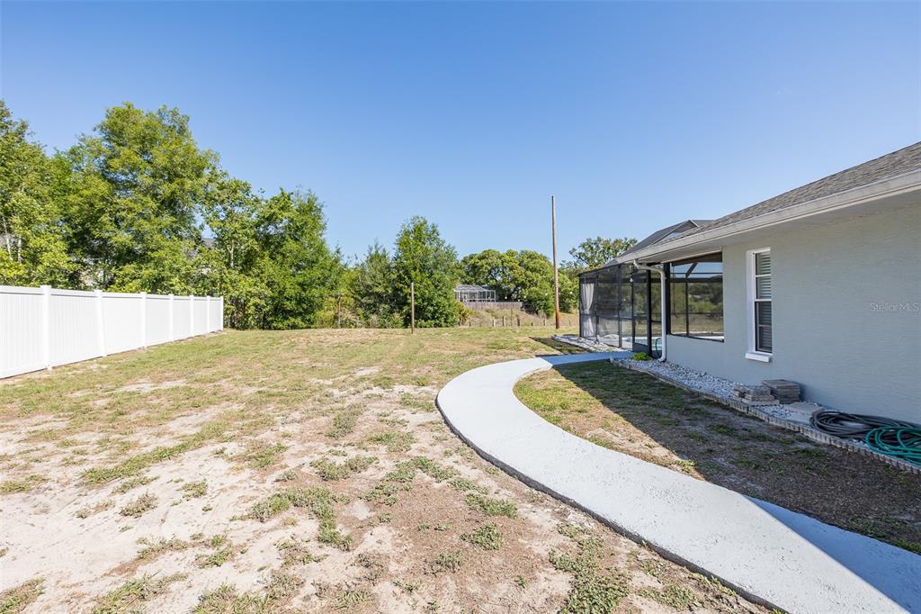 8285 Galgano Lane Spring Hill, FL 34606 - Photo 45 of 55 a view of back yard of the house