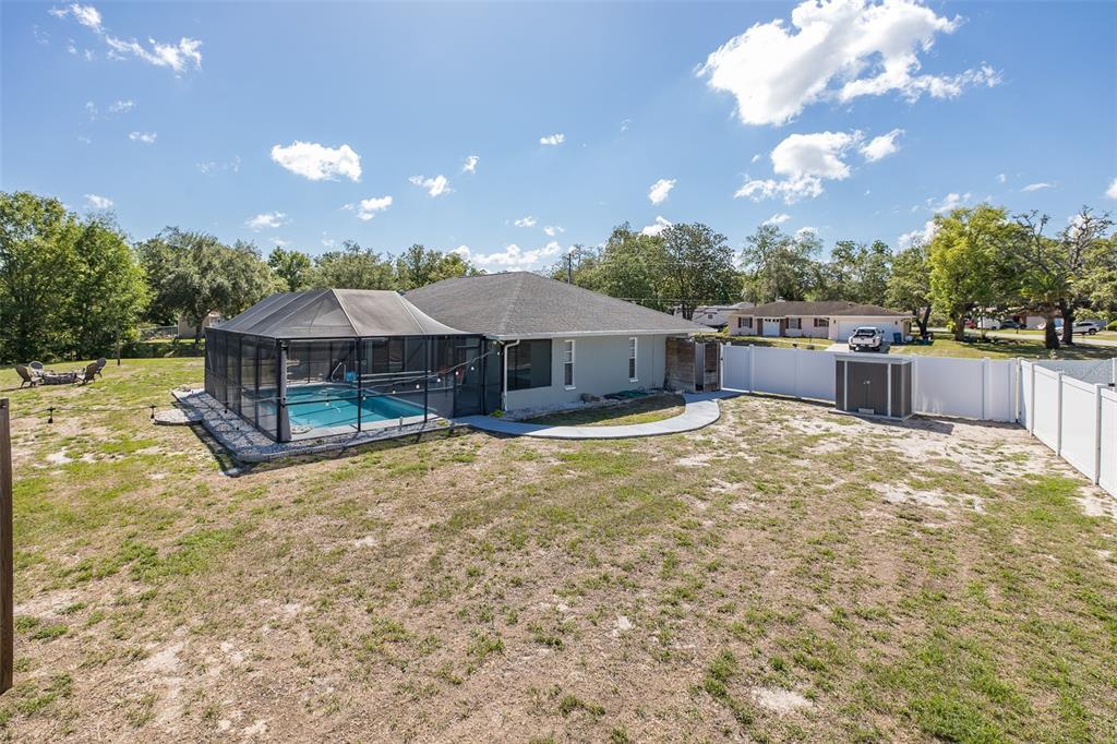 8285 Galgano Lane Spring Hill, FL 34606 - Photo 47 of 55 a house with swimming pool in front of it