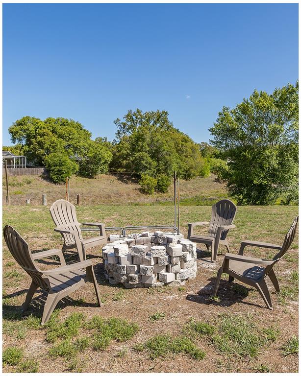 8285 Galgano Lane Spring Hill, FL 34606 - Photo 53 of 55 a view of a chairs and table in patio