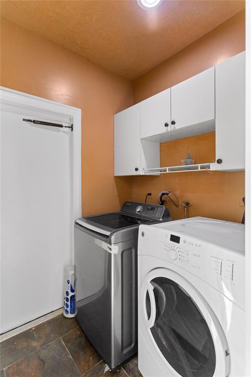 2704 Southwest 128th Avenue Miramar, FL 33027 - Photo 13 of 54 a utility room with dryer and washer