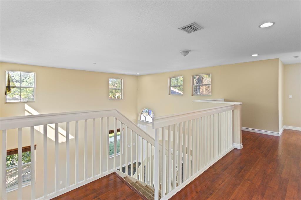 2704 Southwest 128th Avenue Miramar, FL 33027 - Photo 18 of 54 a view of a hallway with windows