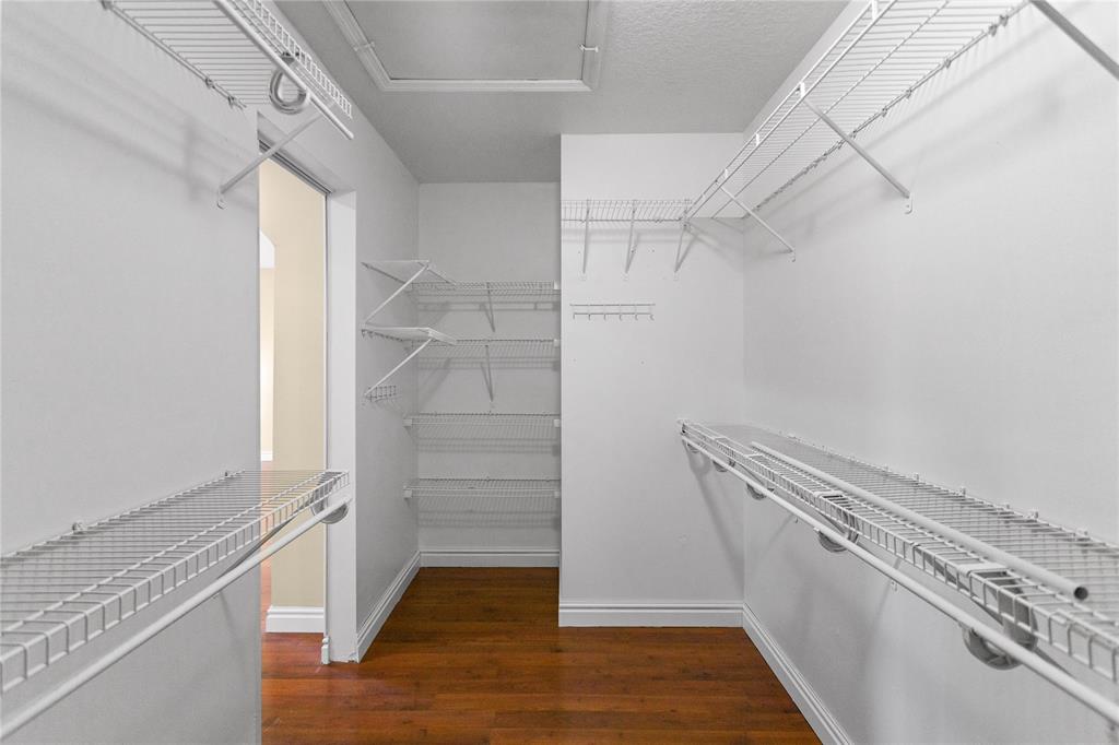 2704 Southwest 128th Avenue Miramar, FL 33027 - Photo 26 of 54 a view of walk in closet with empty racks