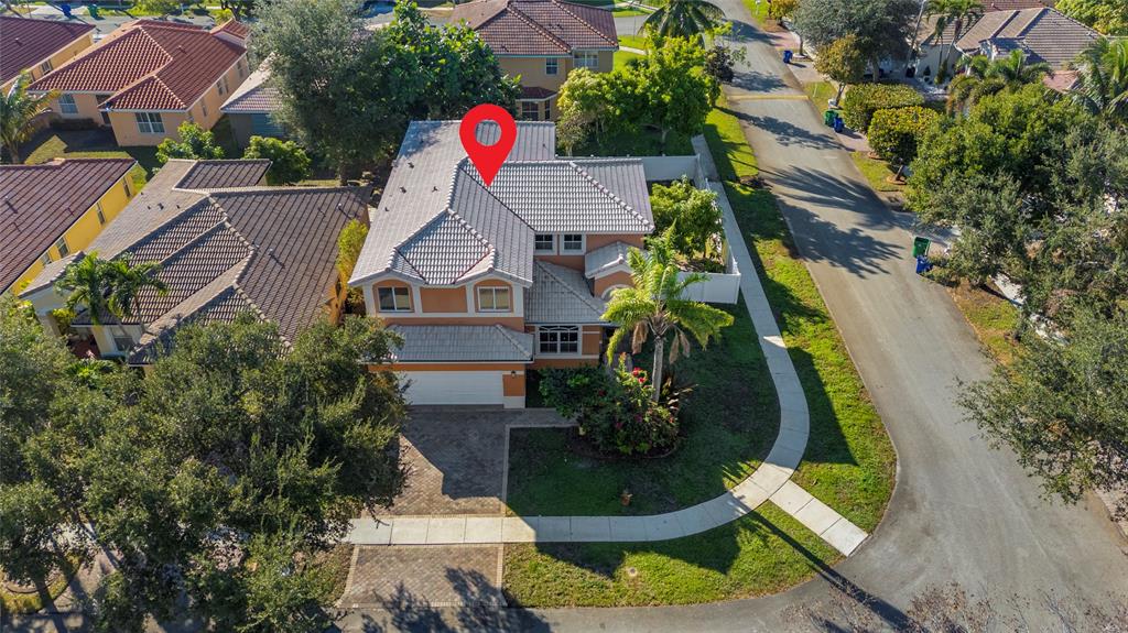 2704 Southwest 128th Avenue Miramar, FL 33027 - Photo 3 of 54 an aerial view of a house