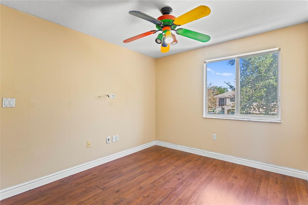 2704 Southwest 128th Avenue Miramar, FL 33027 - Photo 32 of 54 a view of an empty room with a window