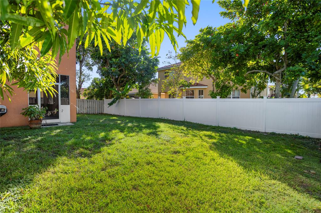 2704 Southwest 128th Avenue Miramar, FL 33027 - Photo 44 of 54 a view of yard with trees