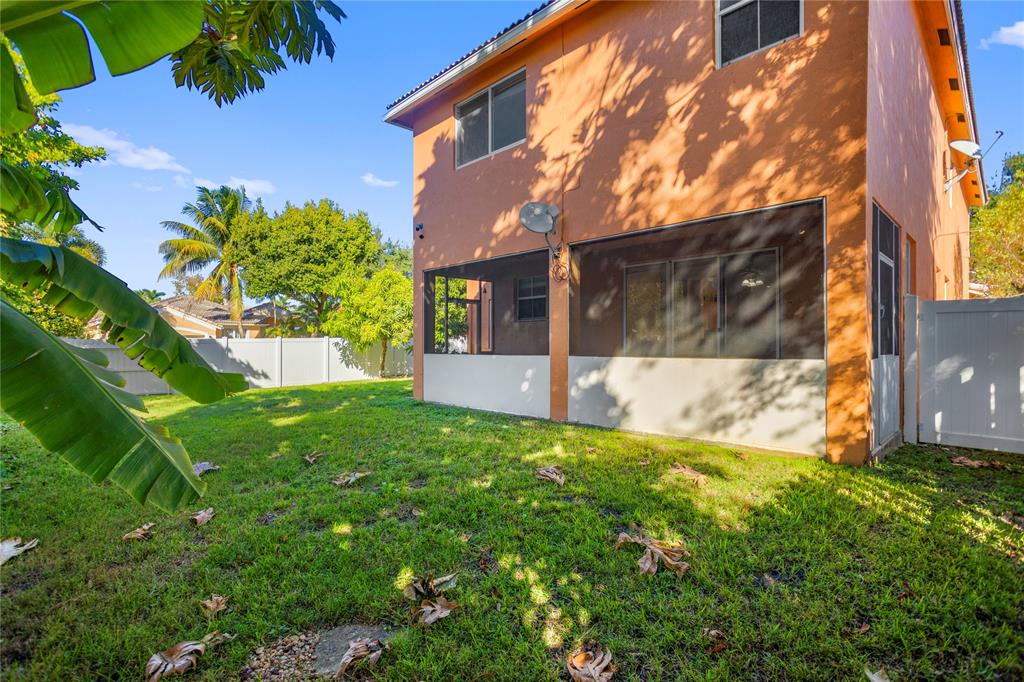 2704 Southwest 128th Avenue Miramar, FL 33027 - Photo 45 of 54 a view of a back yard of the house