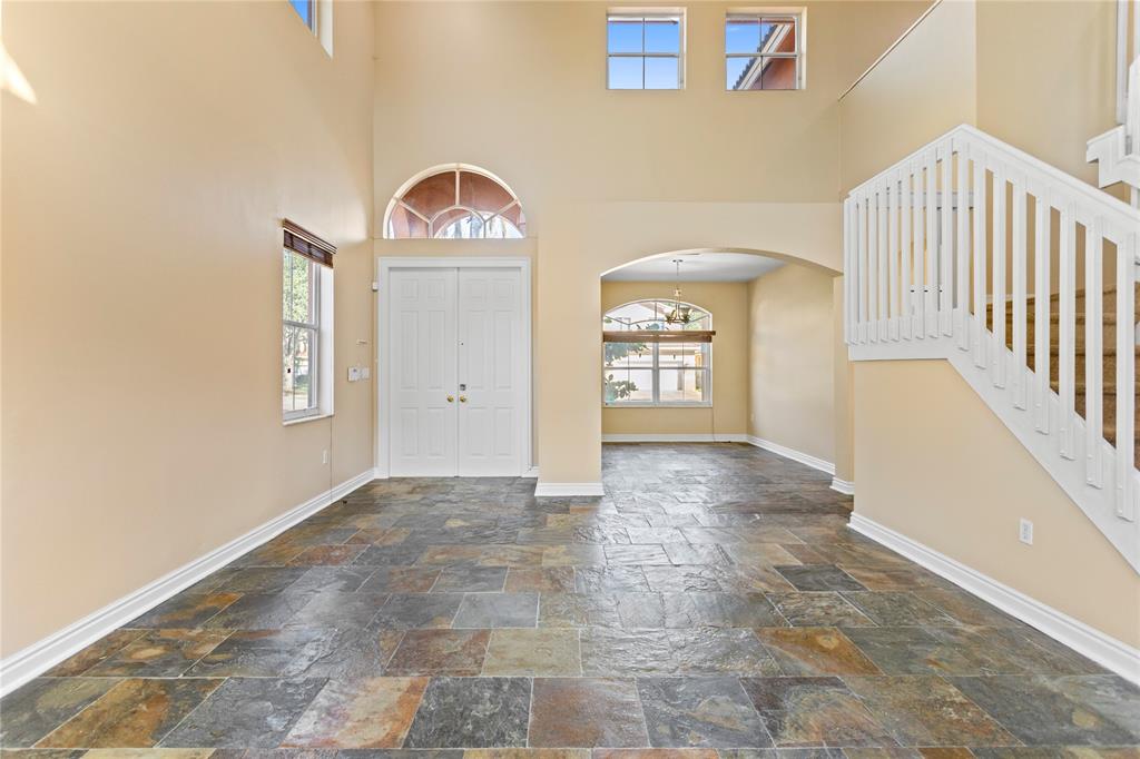 2704 Southwest 128th Avenue Miramar, FL 33027 - Photo 8 of 54 a view of a hallway with entryway front door