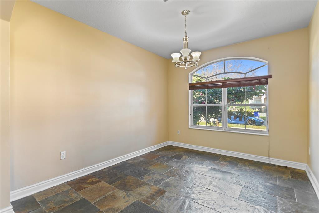 2704 Southwest 128th Avenue Miramar, FL 33027 - Photo 10 of 54 a view of an empty room with a window