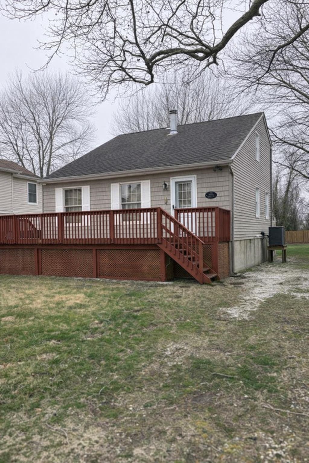 216 2nd Cape May, NJ 08204 - Photo 1 of 16 a view of a house with a yard and wooden fence