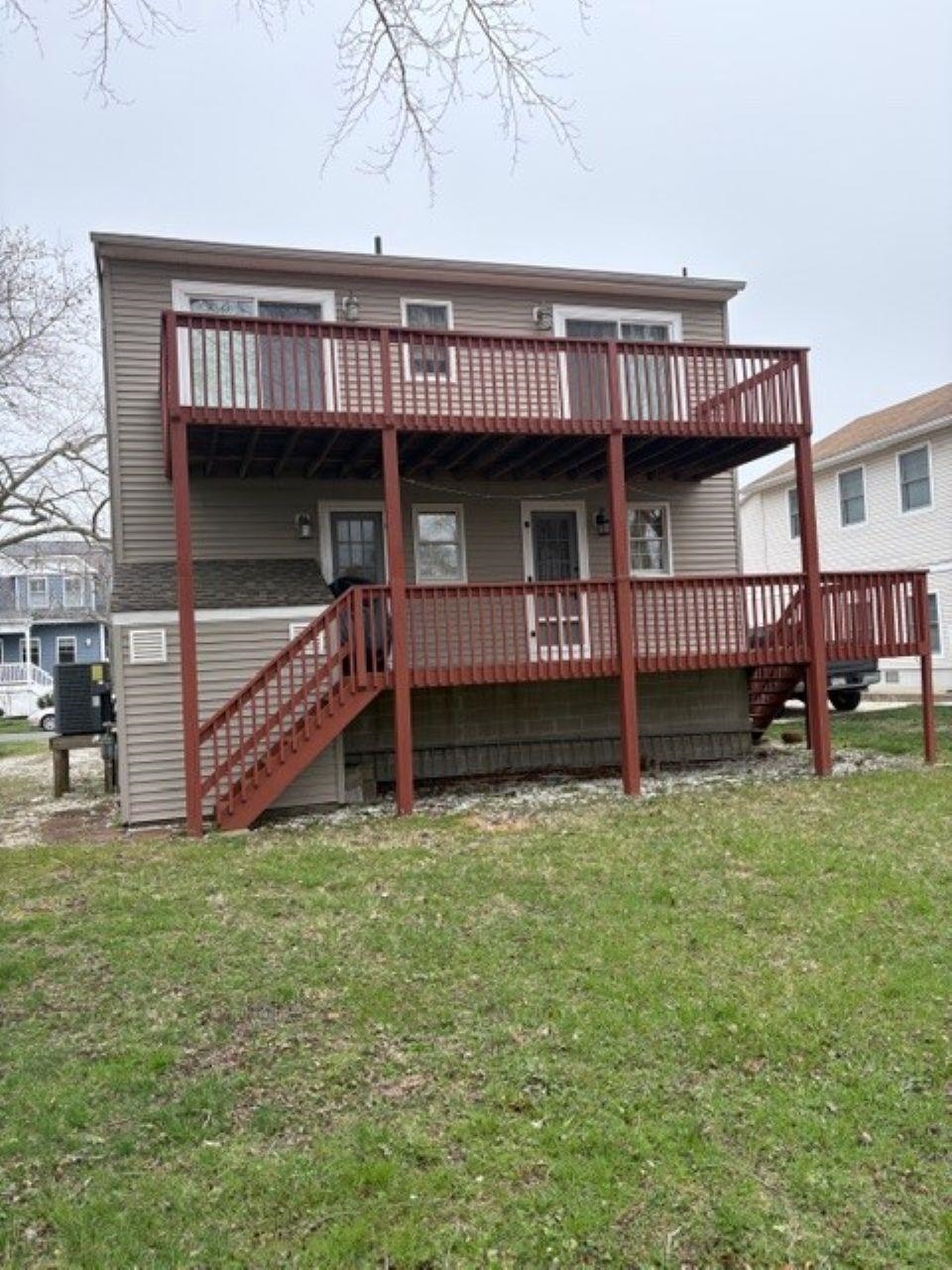 216 2nd Cape May, NJ 08204 - Photo 15 of 16 a view of a house with a yard and deck