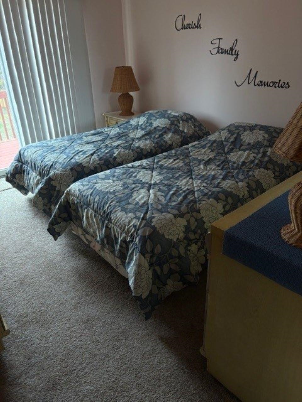 216 2nd Cape May, NJ 08204 - Photo 7 of 16 a bedroom with a bed and a window