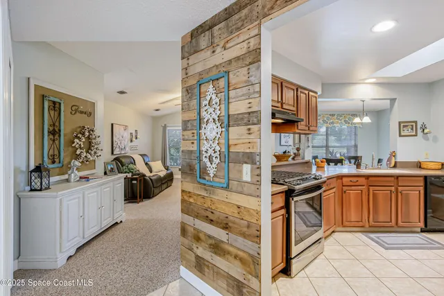 a kitchen with a stove and a sink