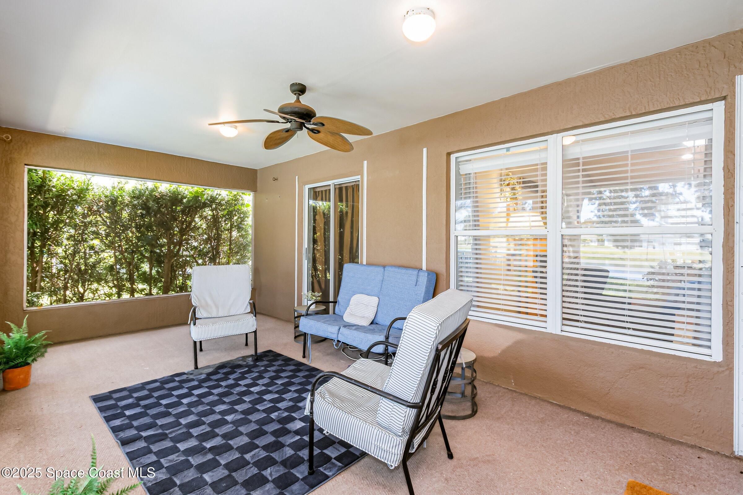 4351 Silver Lake Drive Melbourne, FL 32901 - Photo 33 of 55 a living room with furniture and a window