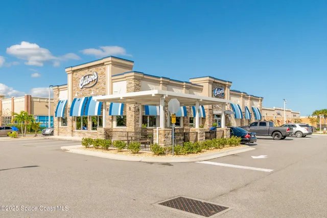 a sign on the side of a street