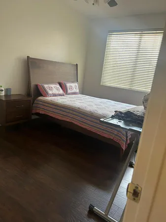 a living room with a couch and a fireplace