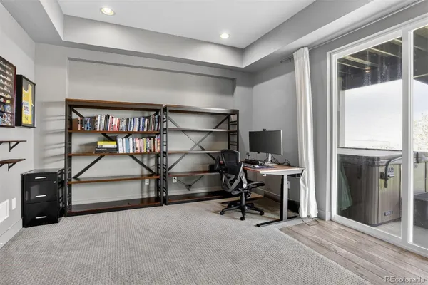 a view of a livingroom with furniture and a window
