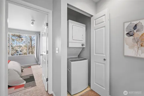 a bathroom with a tub and shower