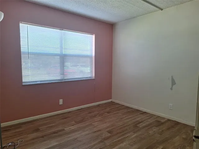 a bathroom with a bath tub with a shower