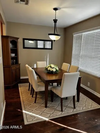 a view of a dining room with furniture