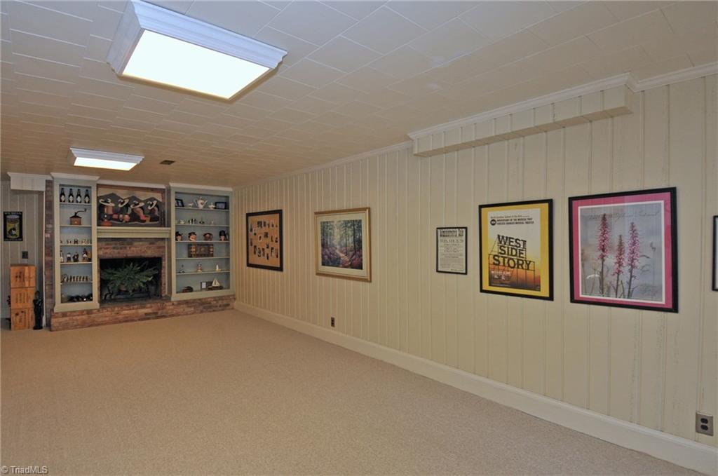 1040 Chester Road Winston-Salem, NC 27104 - Photo 14 of 21 Playroom with fireplace.