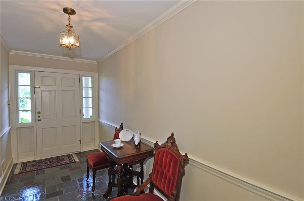 Foyer has lovely Vermont slate flooring.