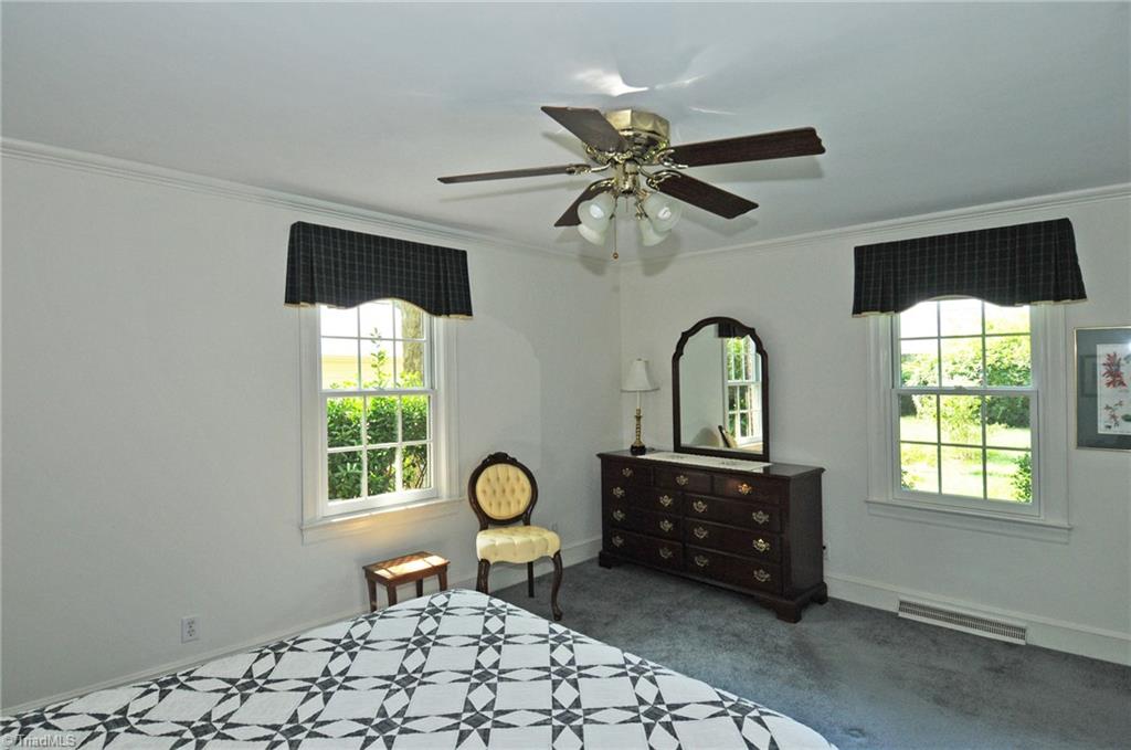 1040 Chester Road Winston-Salem, NC 27104 - Photo 8 of 21 Master bedroom, hardwoods under carpet.