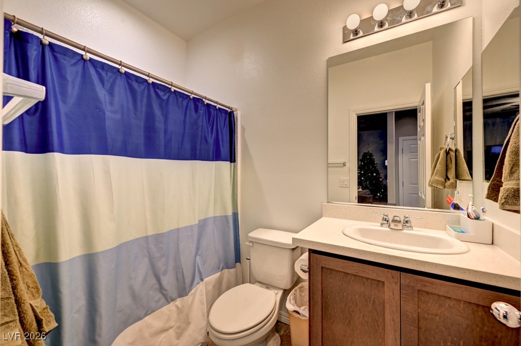 1284 Arcadia Rim Place Henderson, NV 89002 - Photo 19 of 27 Full bath with a shower with curtain and vanity