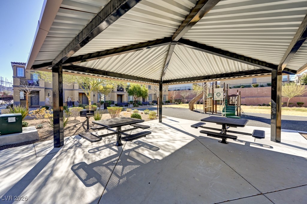 1284 Arcadia Rim Place Henderson, NV 89002 - Photo 25 of 27 View of community featuring a playground and a patio