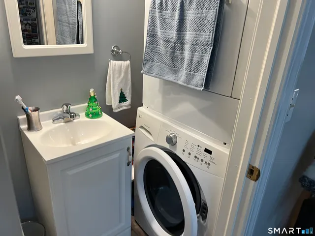a utility room with dryer and washer