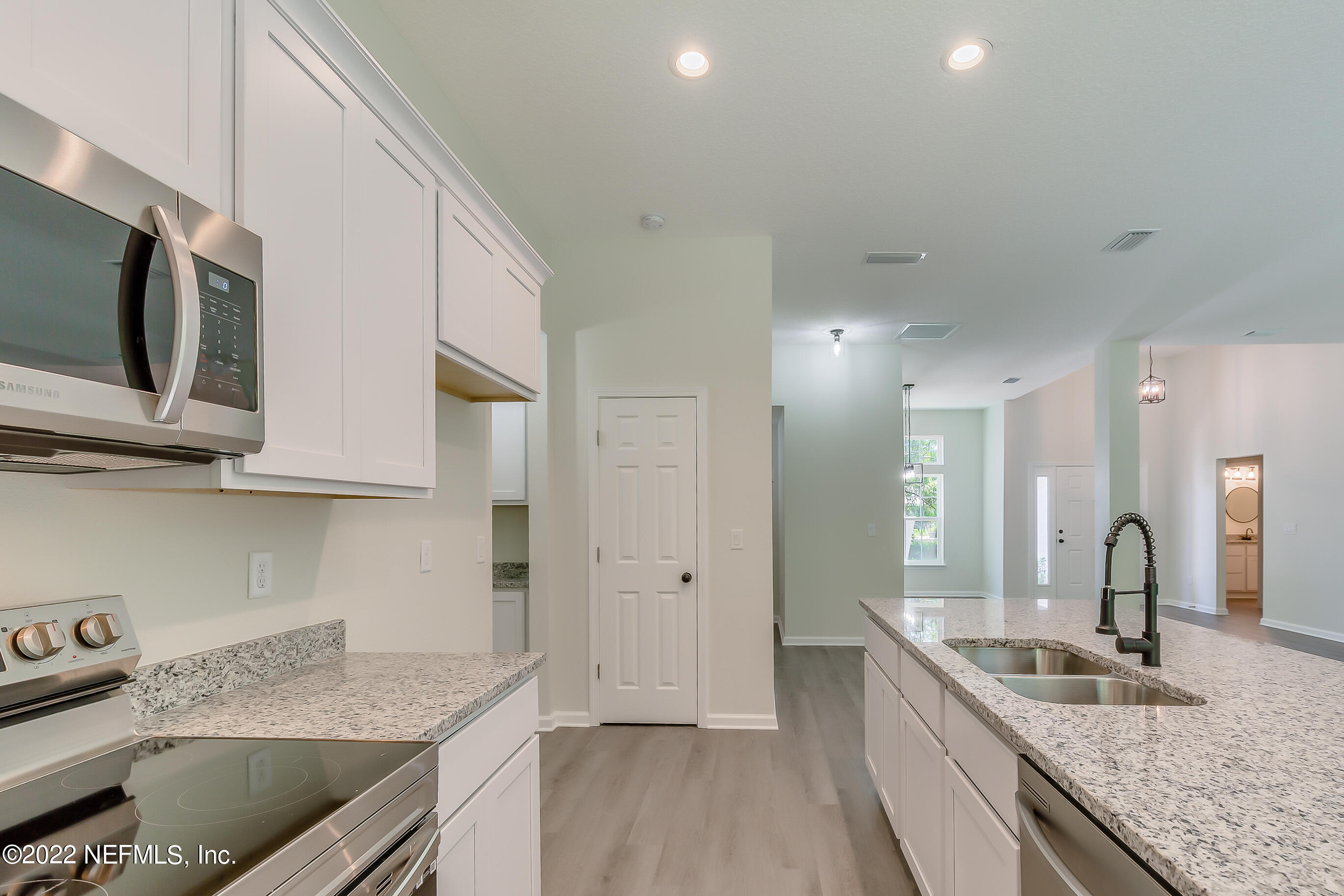 11807 Charlie Road Jacksonville, FL 32218 - Photo 22 of 51 White Cabinets